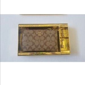 New in Box: Coach Signature Wristlet with Bear and Snowflake Charms